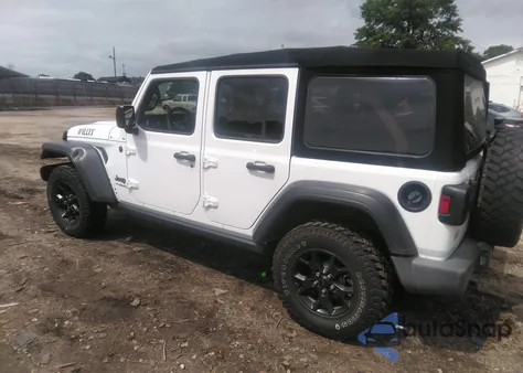 2021 Jeep Wrangler Unlimited Willys 4X4 z USA, uszkodzony, nr VIN 1C4HJXDG8MW597448